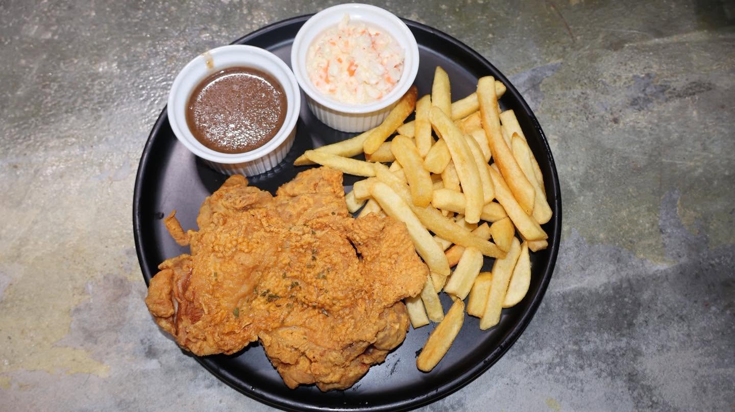 Fried chicken with fries and coleslaw